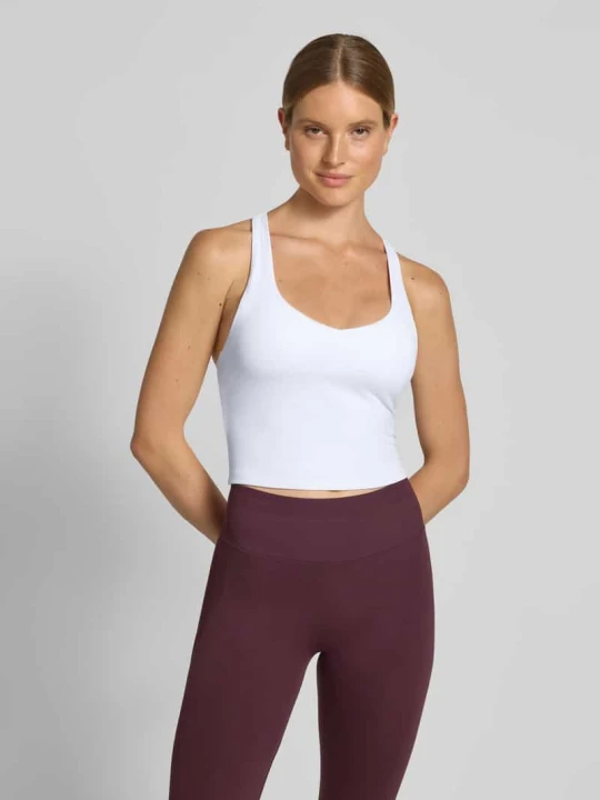 Zdjęcie produktu Top w kroju slim fit z wbudowanym biustonoszem model 'Anywhere' Fabletics Biały