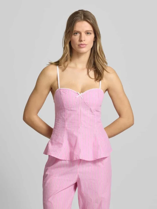 Zdjęcie produktu Top o kroju slim fit z ozdobną kokardą Gina Tricot Mocnoróżowy