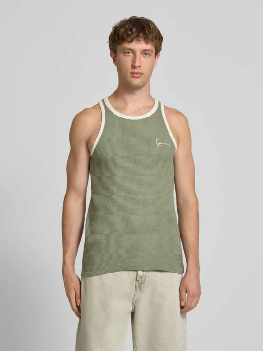 Zdjęcie produktu Top o kroju slim fit z wyhaftowanym logo Karl Kani Oliwkowy