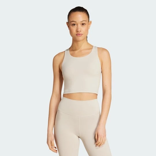 Zdjęcie produktu Top z wbudowanym biustonoszem adidas All Me Medium Support beżowy