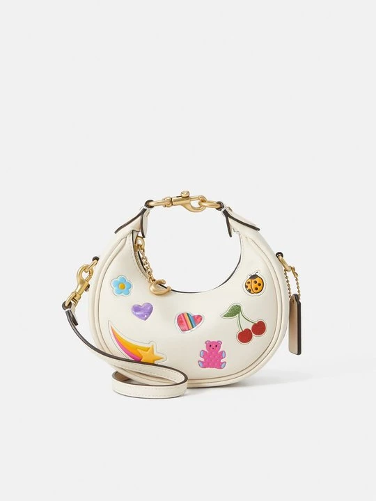 Zdjęcie produktu Torba na ramię Coach mleczny