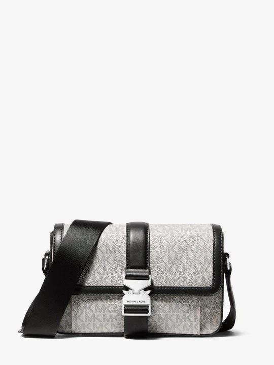 Zdjęcie produktu Torebka do przewieszenia przez ramię Hudson z charakterystycznym logo Michael Kors NIKLOWY (Srebrny)