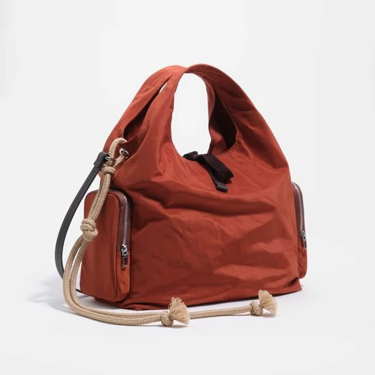 Zdjęcie produktu Torebka do ręki średnia nylon rdzawa BIMBA Y LOLA