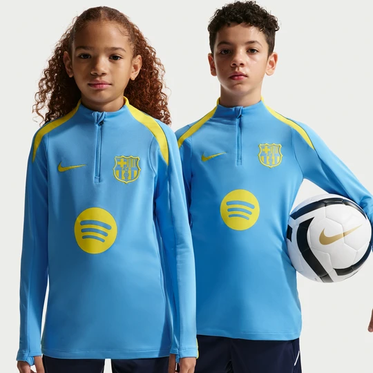 Zdjęcie produktu Treningowa koszulka piłkarska z dzianiny dla dużych dzieci Nike Dri-FIT FC Barcelona Strike (wersja czwarta) - Niebieski