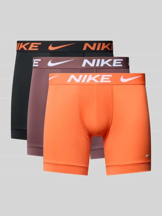 Zdjęcie produktu Trunks z detalami z logo w 3‑pakiecie Nike Pomarańczowy
