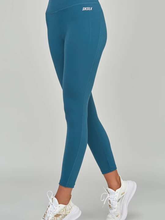 Zdjęcie produktu Turkusowe sportowe legginsy damskie Essential SikSilk Teal