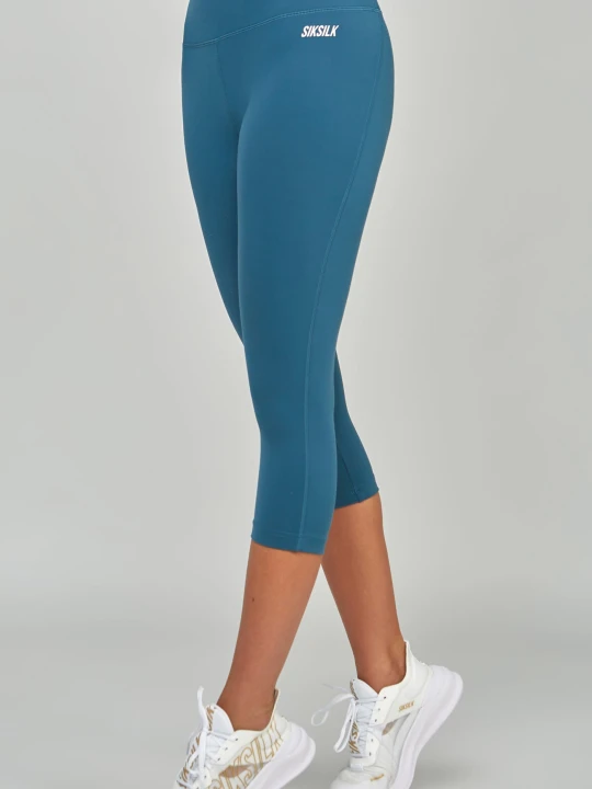 Zdjęcie produktu Turkusowe sportowe spodnie damskie Essential Capri SikSilk Teal