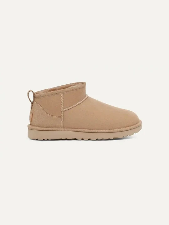 Zdjęcie produktu UGG Skórzane botki "Classic Ultra Mini" w kolorze beżowym rozmiar: 38