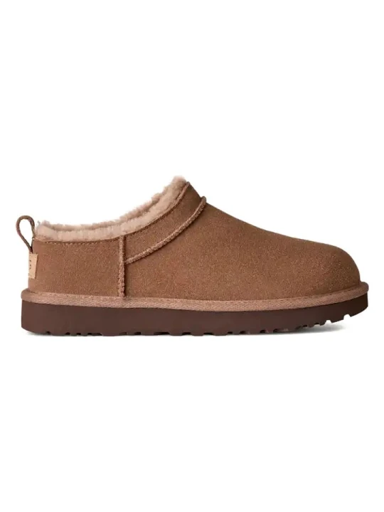 Zdjęcie produktu UGG Skórzane kapcie "Classic Micro" w kolorze jasnobrązowym rozmiar: 38