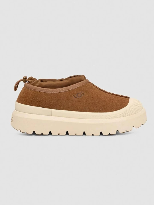 Zdjęcie produktu UGG Skórzane slippersy "Tasman Weather" w kolorze kremowo-jasnobrązowym rozmiar: 42
