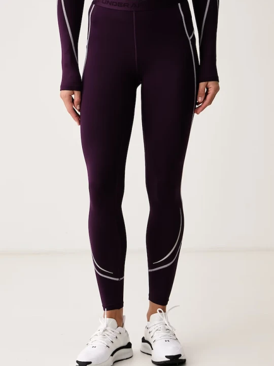 Zdjęcie produktu Under Armour legginsy sportowe damskie ColdGear fioletowy