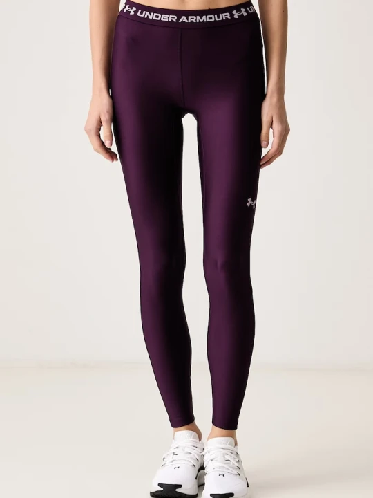 Zdjęcie produktu Under Armour legginsy sportowe damskie HeatGear fioletowy