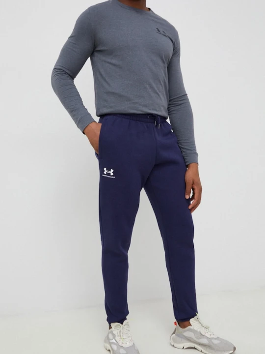 Zdjęcie produktu Under Armour spodnie dresowe męskie z bawełną Essential Fleece granatowy