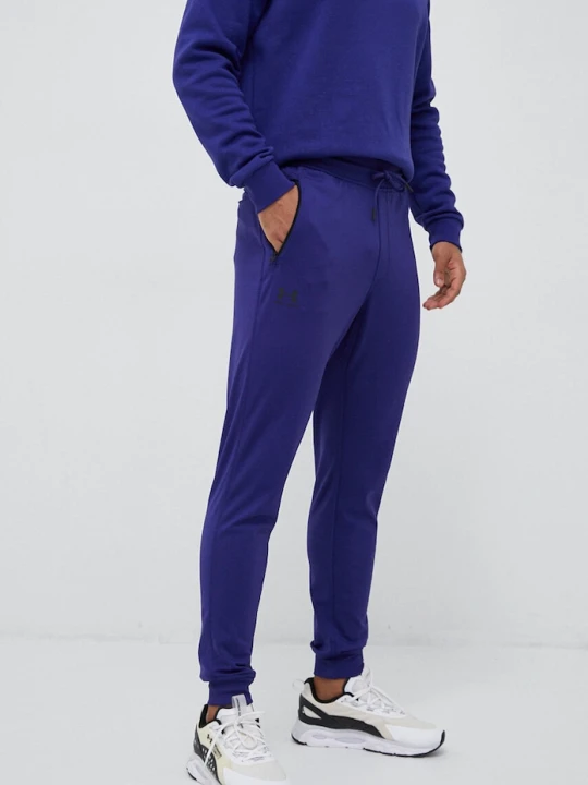 Zdjęcie produktu Under Armour spodnie dresowe fioletowy