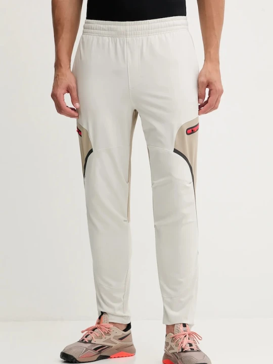 Zdjęcie produktu Under Armour spodnie dresowe Unstoppable szary