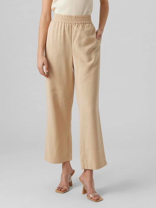 Zdjęcie produktu Vero Moda Spodnie "Carmen" w kolorze beżowym rozmiar: S/L32