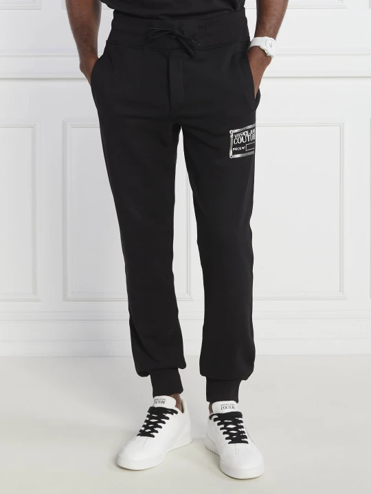 Zdjęcie produktu Versace Jeans Couture Spodnie dresowe | Oversize fit czarny