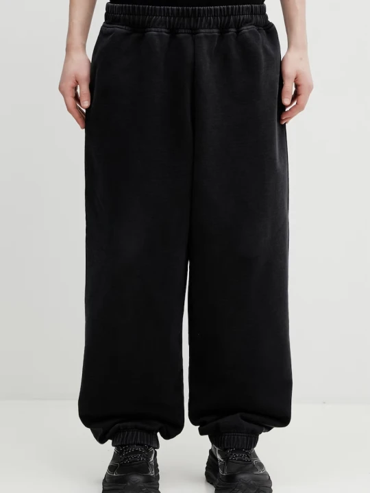 Zdjęcie produktu VETEMENTS spodnie dresowe bawełniane Biker Cross Logo