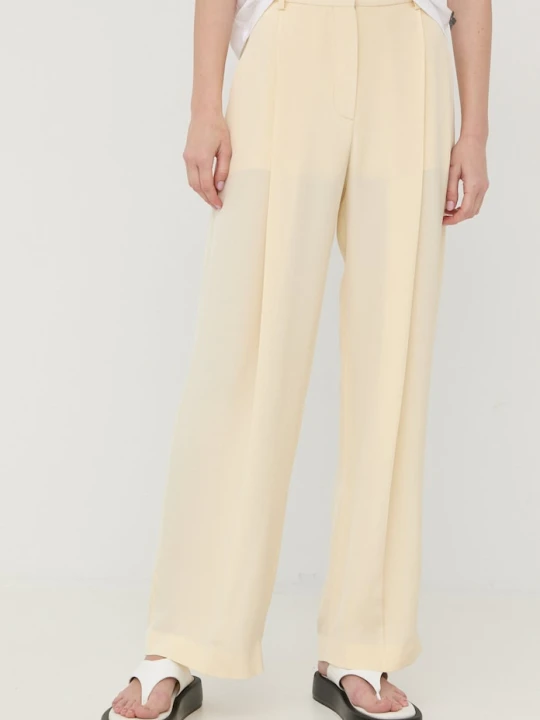 Zdjęcie produktu Victoria Beckham spodnie jedwabne beżowy