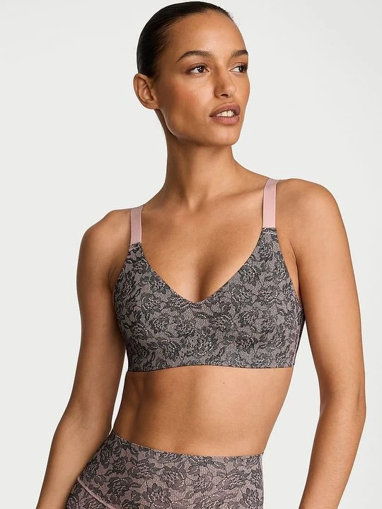 Zdjęcie produktu VSX Biustonosz sportowy z dekoltem V VSX Featherweight Victoria's Secret Motyw zwierzęcy