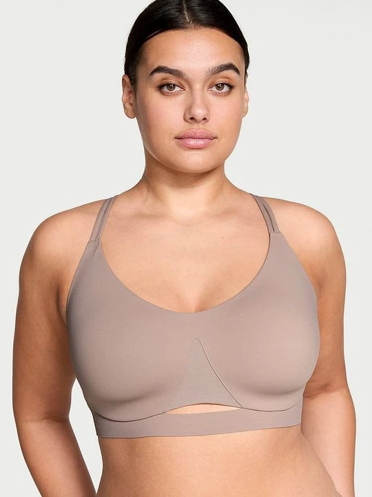Zdjęcie produktu VSX Biustonosz sportowy z lekkim wsparciem Elevate Strappy Victoria's Secret Beżowy