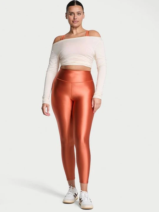 Zdjęcie produktu VSX Legginsy z błyszczącego materiału VSX GlossyTech Victoria's Secret Pomarańczowy