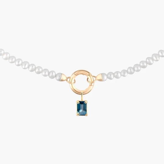 Zdjęcie produktu W.KRUK Wisiorek złoty z topazem london blue