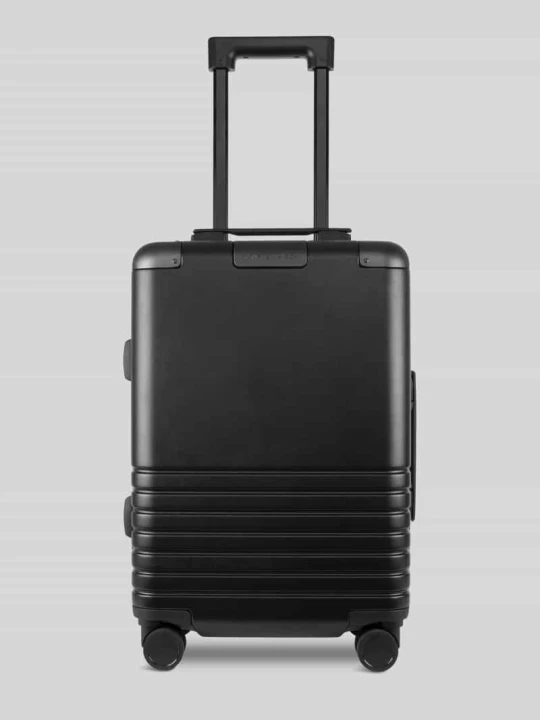 Zdjęcie produktu Walizka podręczna z workiem na bieliznę i czterema organizerami do pakowania model ‘HEATHROW CABIN’ KAPTEN & SON Czarny