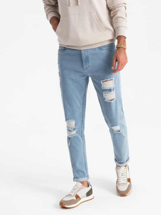 Zdjęcie produktu Washowane męskie jeansowe spodnie TAPERED FIT z przetarciami – błękitne V1 - Rozmiar: XL Ombre Clothing błękitny