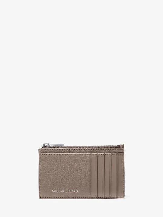 Zdjęcie produktu Wąski portfel Cooper ze skóry groszkowej na zamek błyskawiczny Michael Kors
