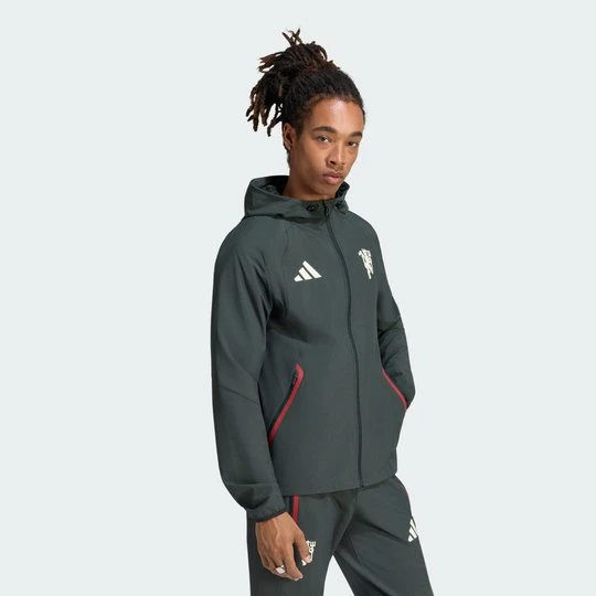 Zdjęcie produktu Wiatrówka z suwakiem na całej długości Manchester United Tiro Travel Adidas Jungle Ink