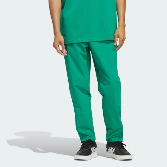 Zdjęcie produktu Woven Track Pants Adidas Semi Court Green