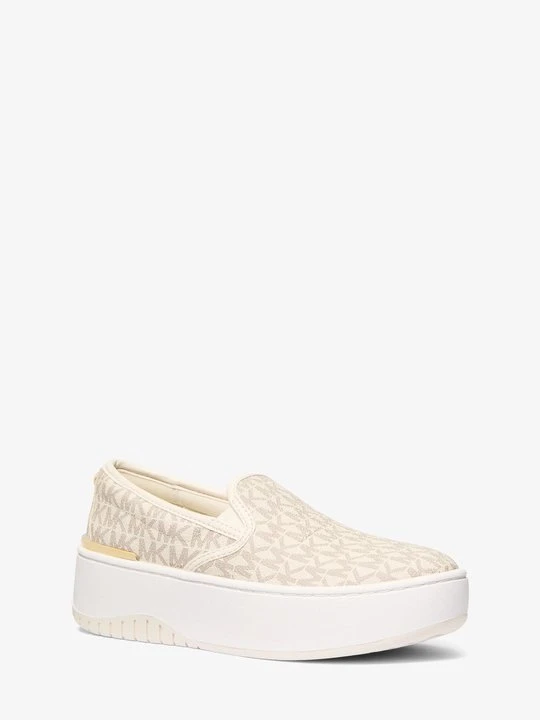 Zdjęcie produktu Wsuwane sneakersy Dottie na platformie z charakterystycznym logo Michael Kors