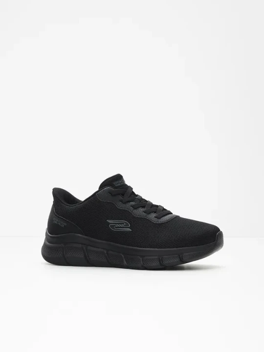 Zdjęcie produktu Wygodne, wsuwane sneakersy marki Sketchers z pianką z pamięcią BonPrix czarny