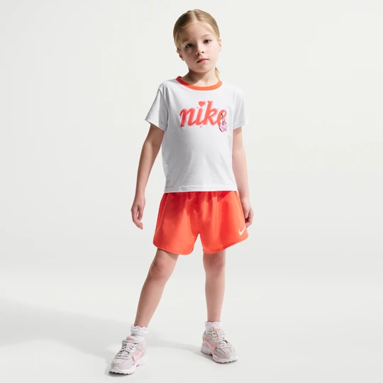 Zdjęcie produktu Zestaw Nike z T-shirtem i spodenkami Crossover dla małych dzieci Dri-FIT - Pomarańczowy