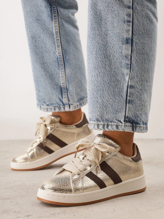 Zdjęcie produktu Złote Sneakersy z Ozdobnymi Paskami Doloreth Gowin