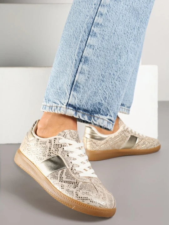 Zdjęcie produktu Złote Wężowe Sneakersy Tenisówki w Kultowym Stylu Neolithaen Ideal