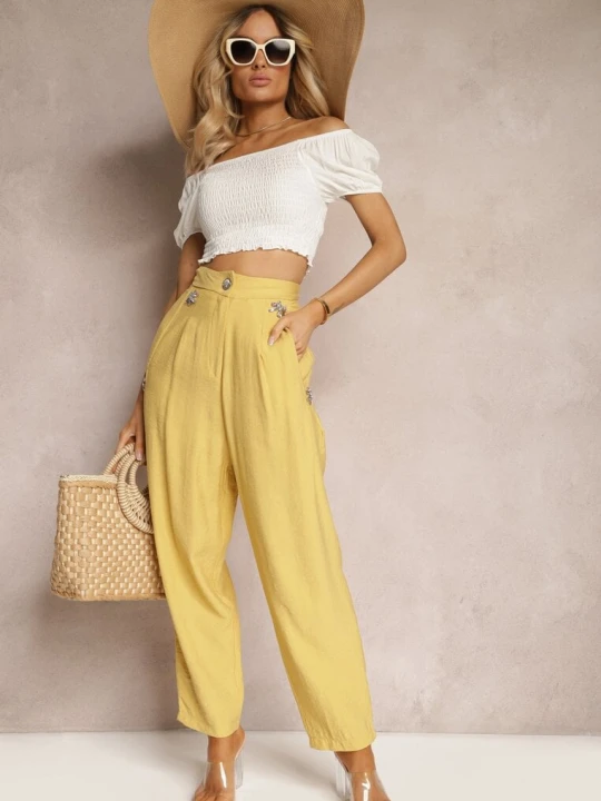 Zdjęcie produktu Żółte Spodnie High Waist Ozdobione Cyrkoniami Sajara Miss Poem