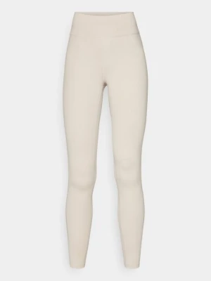 Legginsy Adidas beżowy