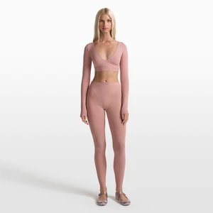 Legginsy damskie z wysokim stanem i wstawką w kształcie litery V NikeSKIMS Weightless Layers - Różowy