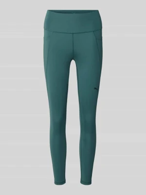Legginsy o kroju skinny fit do sportu z nadrukiem z logo Puma Ciemnozielony
