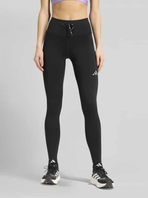 Legginsy o kroju skinny fit sport z nadruk z logo model 'Run' Adidas Czarny