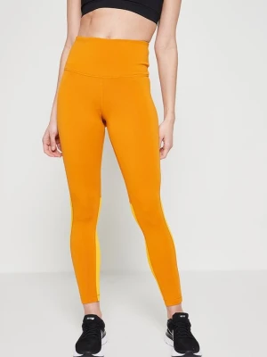 Legginsy Reebok musztardowy