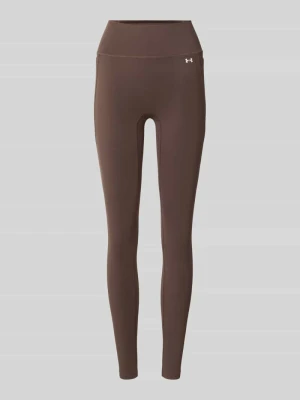 legginsy sportowe o kroju slim fit z nadrukiem z logo Under Armour Ciemnobrązowy