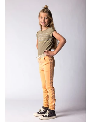 Like Flo Spodnie dresowe w kolorze musztardowym rozmiar: 164