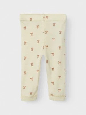Lil Atelier Legginsy "Nalu" w kolorze kremowym rozmiar: 80 Lil' Atelier