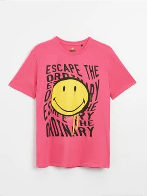 Luźna koszulka z nadrukiem Smiley® różowa House
