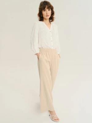 Luźne kremowe spodnie z gumką w talii Greenpoint