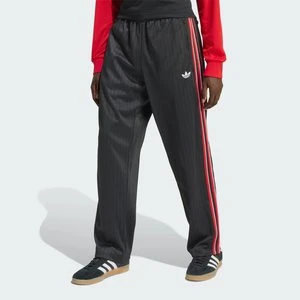 Luźne spodnie dresowe w prążki Firebird Adidas