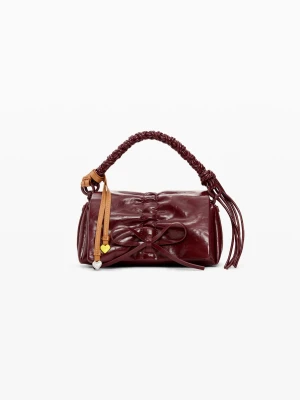 Mała błyszcząca torebka z kokardą Desigual